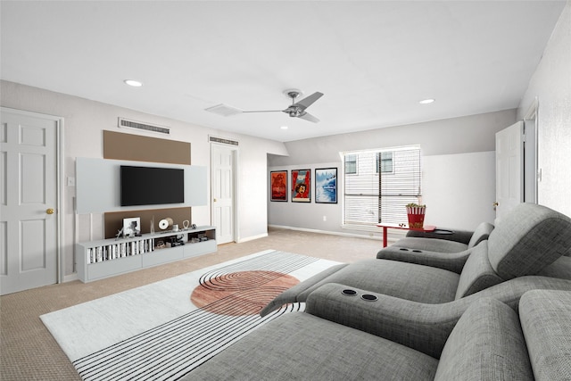 living room featuring light colored carpet and ceiling fan