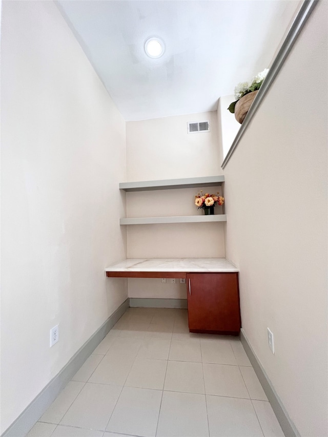 interior space featuring light tile patterned flooring