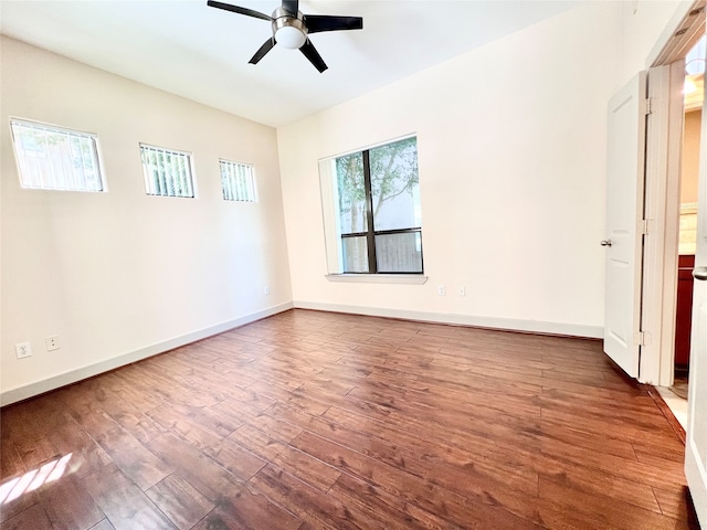 unfurnished room with hardwood / wood-style flooring and ceiling fan