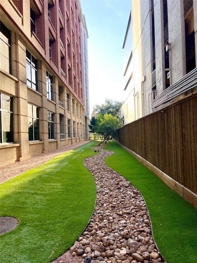 view of community with a lawn