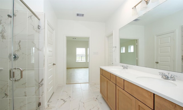 bathroom featuring vanity and walk in shower