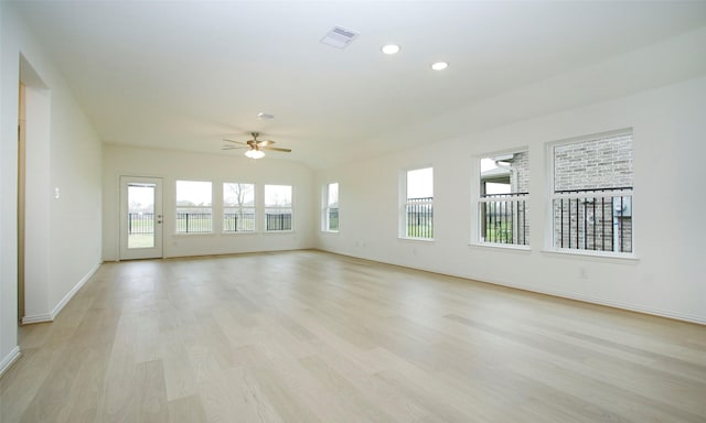 empty room featuring ceiling fan and light wood-type flooring