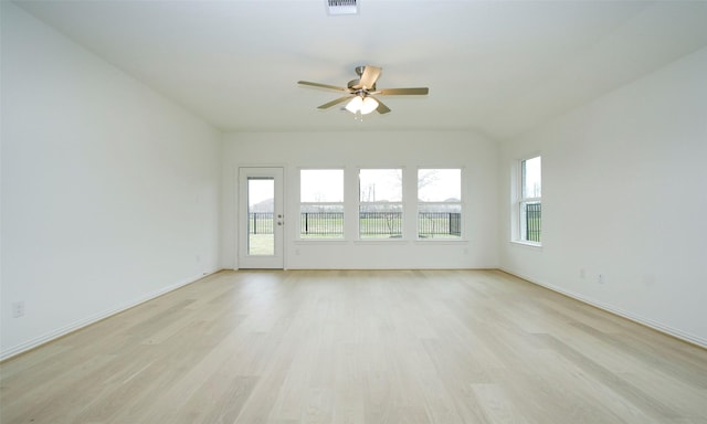 spare room featuring ceiling fan and light hardwood / wood-style floors