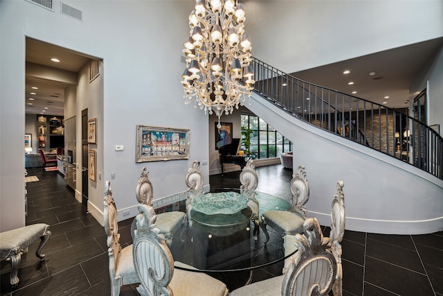 tiled dining room with a high ceiling