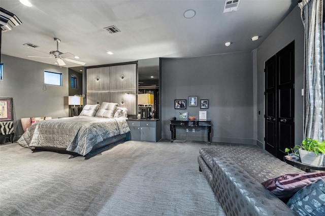 bedroom with ceiling fan and carpet flooring