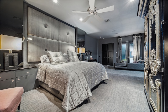 carpeted bedroom with ceiling fan