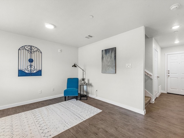 unfurnished room featuring dark hardwood / wood-style floors