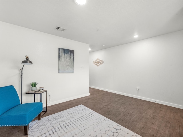 living area featuring dark hardwood / wood-style flooring