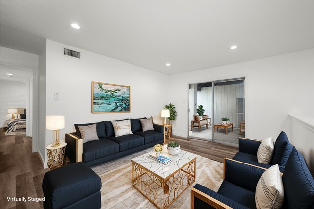 living room with light hardwood / wood-style floors