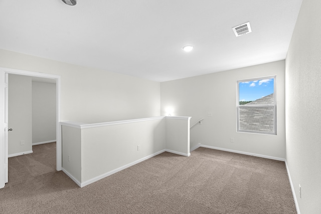 spare room with carpet flooring