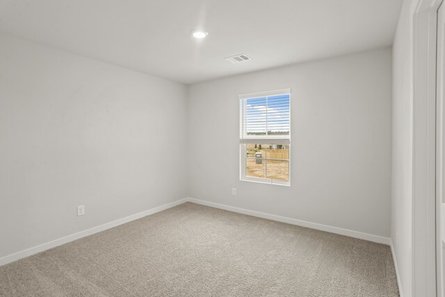 unfurnished room with carpet floors