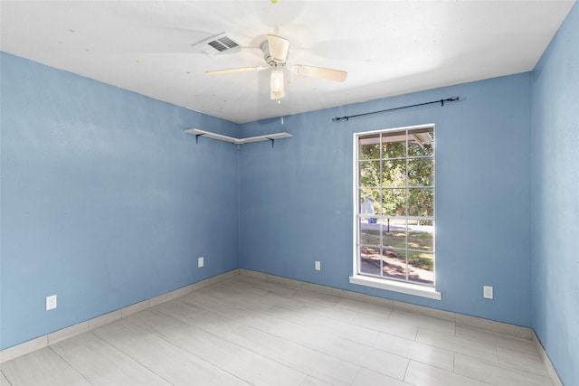 empty room with ceiling fan