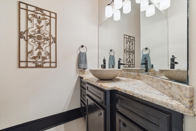 bathroom featuring vanity and tile patterned floors