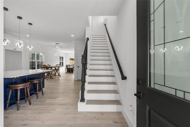 entrance foyer with light wood-type flooring