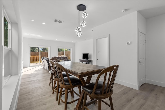 dining room featuring light hardwood / wood-style floors