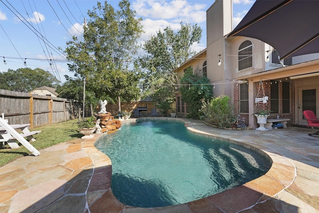 view of pool featuring a patio area