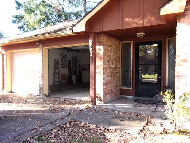 entrance to property featuring a garage