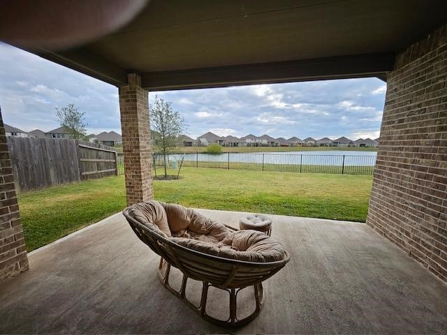 view of patio / terrace with a water view