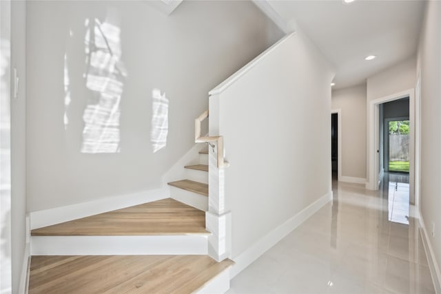 staircase with tile patterned flooring