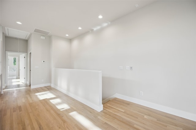 empty room with light wood-type flooring