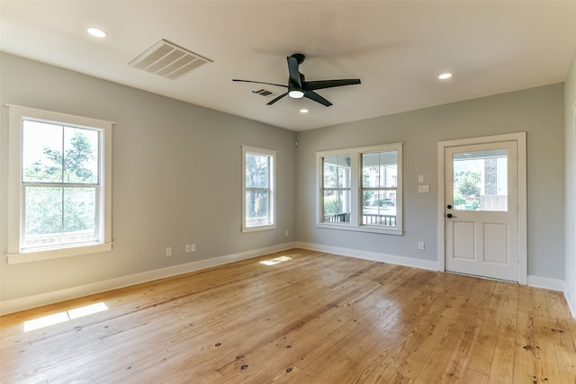 interior space with light hardwood / wood-style flooring and ceiling fan