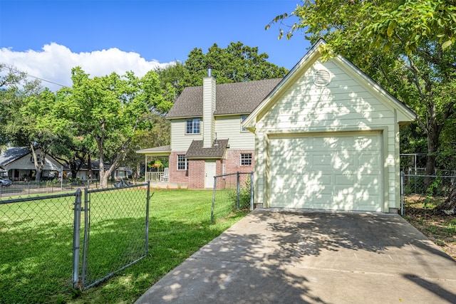 view of front of home featuring a garage, an outdoor structure, and a front yard