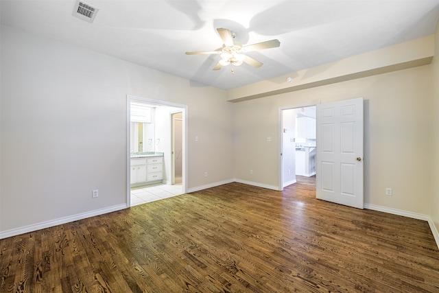 unfurnished room with ceiling fan and light hardwood / wood-style flooring