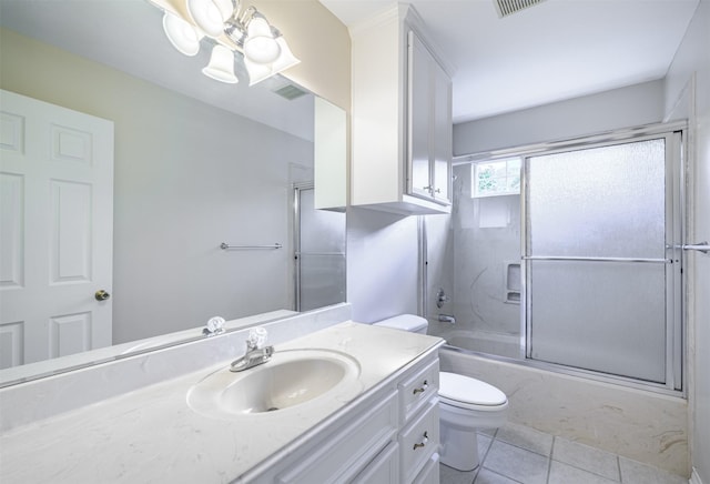 full bathroom with toilet, combined bath / shower with glass door, a chandelier, vanity, and tile patterned flooring