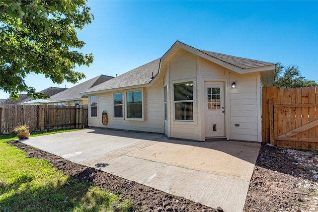 rear view of house with a patio area