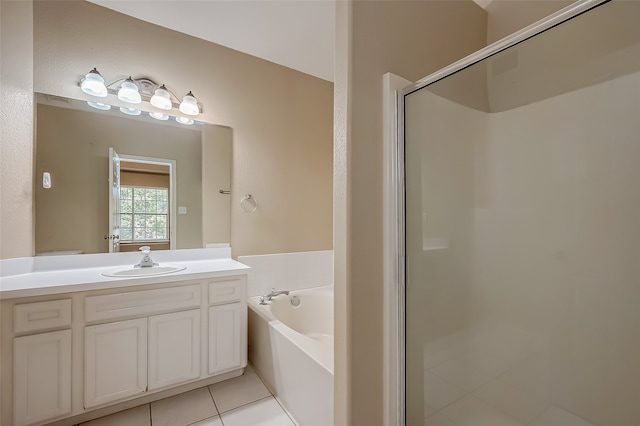 bathroom featuring vanity, tile patterned floors, and independent shower and bath