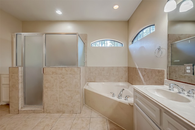 bathroom with vanity, plus walk in shower, and tile patterned floors