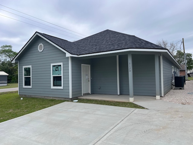 view of front of home featuring central air condition unit