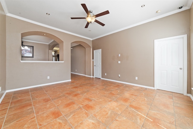 empty room with crown molding and ceiling fan