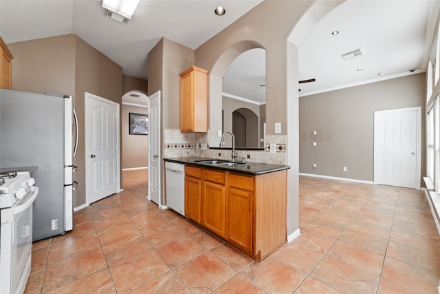 kitchen with light tile patterned flooring, sink, white appliances, tasteful backsplash, and crown molding