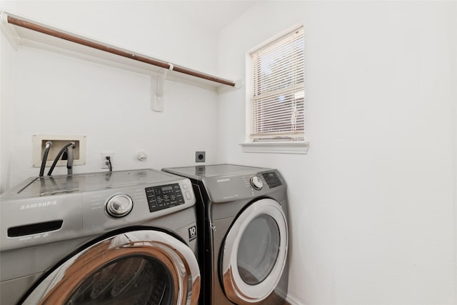 washroom featuring independent washer and dryer