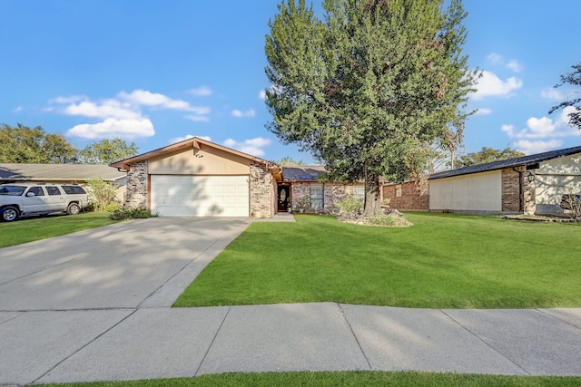 single story home featuring a front yard and a garage