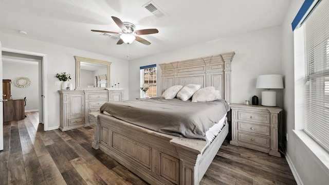 bedroom with dark wood-type flooring and ceiling fan