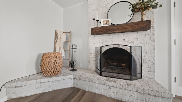 room details with ornamental molding and hardwood / wood-style floors