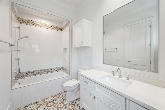 full bathroom featuring ornamental molding, vanity, toilet, and tiled shower / bath