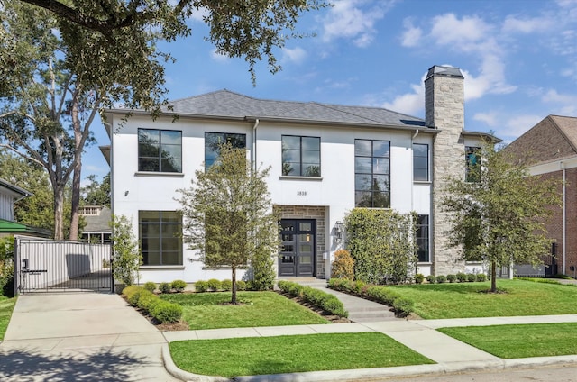 view of front of home with a front lawn