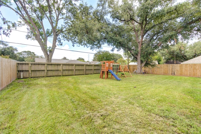 view of yard featuring a playground