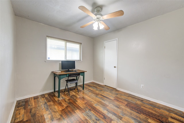 home office featuring ceiling fan, a textured ceiling, and dark hardwood / wood-style floors