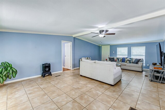 tiled living room featuring lofted ceiling, ornamental molding, and ceiling fan