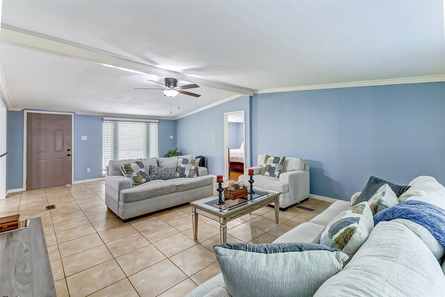 tiled living room with ceiling fan and crown molding