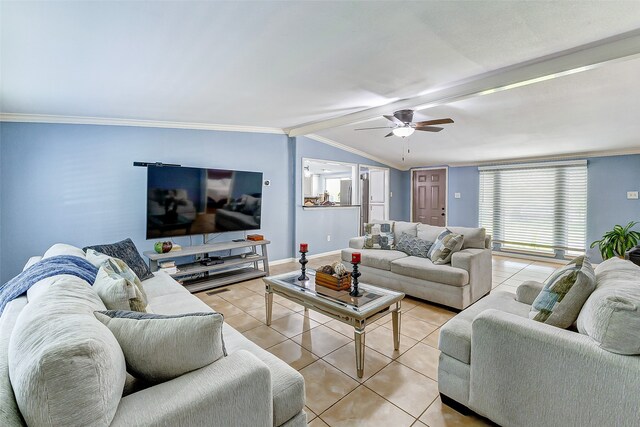 tiled living room with ceiling fan, vaulted ceiling with beams, and ornamental molding