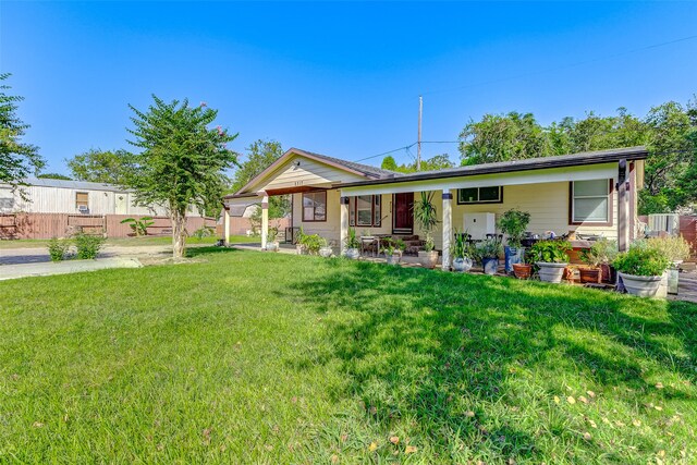 exterior space with a front lawn