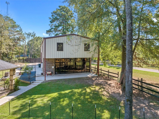 view of outdoor structure with a yard