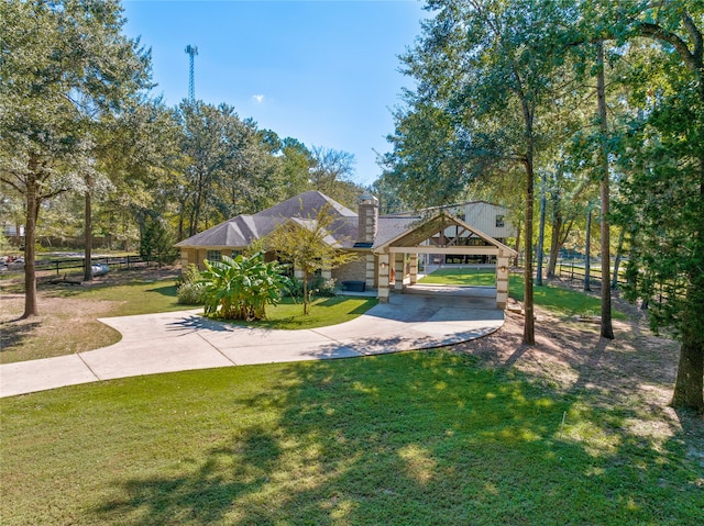 view of front facade with a garage and a front lawn