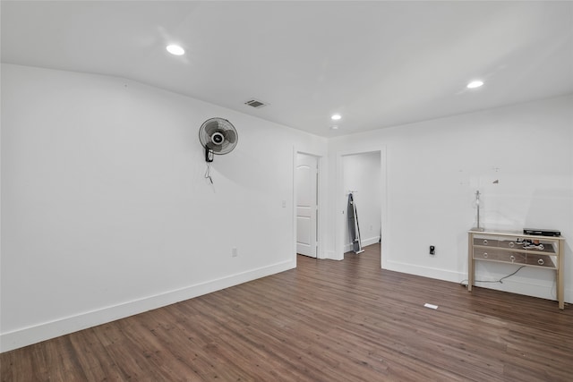 empty room featuring dark hardwood / wood-style floors