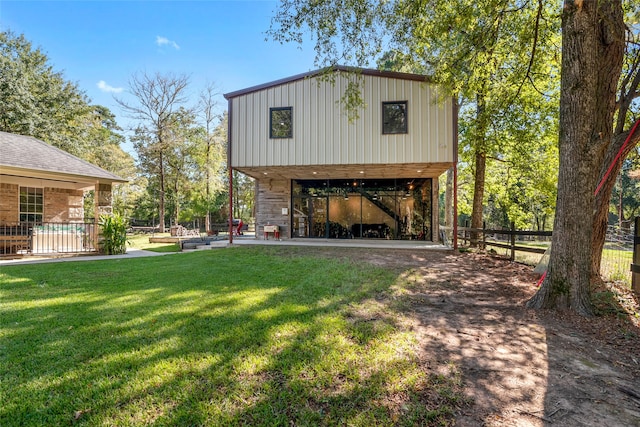 view of outbuilding with a yard